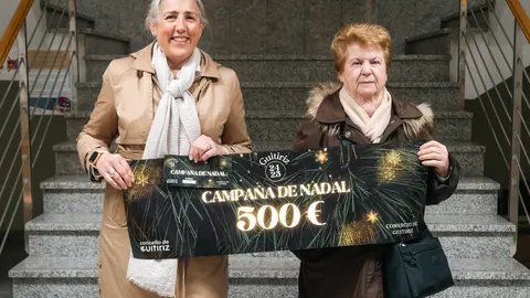 FOTO GUITIRIZ - O Concello de Guitiriz fai entrega do vale de 500 euros da campaña de Nadal do Comercio