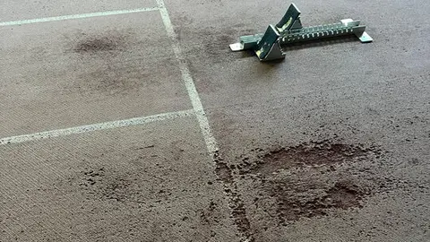 Salida de la recta del módulo cubierto del estadio Pérez Rivera de atletismo