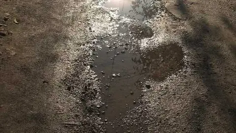 Bache, asfalto, carretera